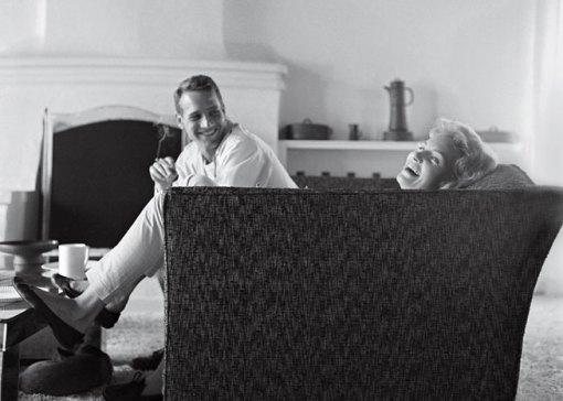 Newman and actress Joanne Woodward share a laugh in their Beverly Hills home in 1958, the year they were married. By Sid Avery/MPTV.net