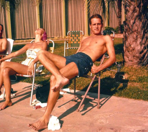 A bronzed Newman relaxes in the sun, April 1962. By Gene Lesser/Globe Photos.