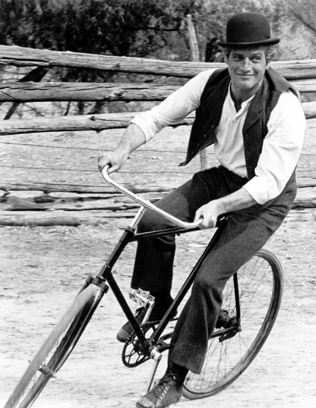 Newman in character as bicycle-riding rogue Butch Cassidy. From Twentieth Century Fox Film Corp./Photofest.