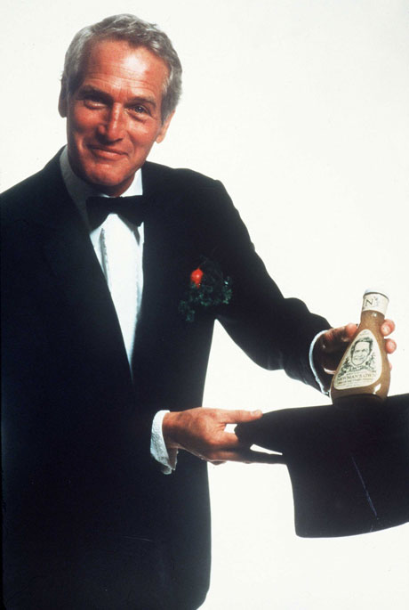 Enjoying another of his passions, auto racing, Newman celebrates at Lime Rock Park racetrack, in Connecticut, July 1980. By Ron Galella/WireImage